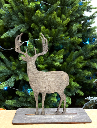 Олень большой деревянный на подставке